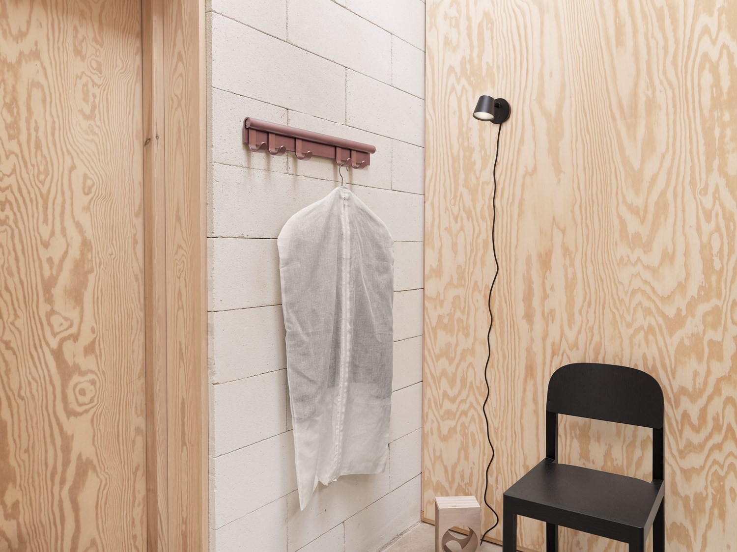 Coil Coat Rack 60 cm Plum, Tip Wall Lamp Black, Workshop Chair Black. Coil Coat Rack 60 cm Plum, Tip Wall Lamp Black, Workshop Chair Black.