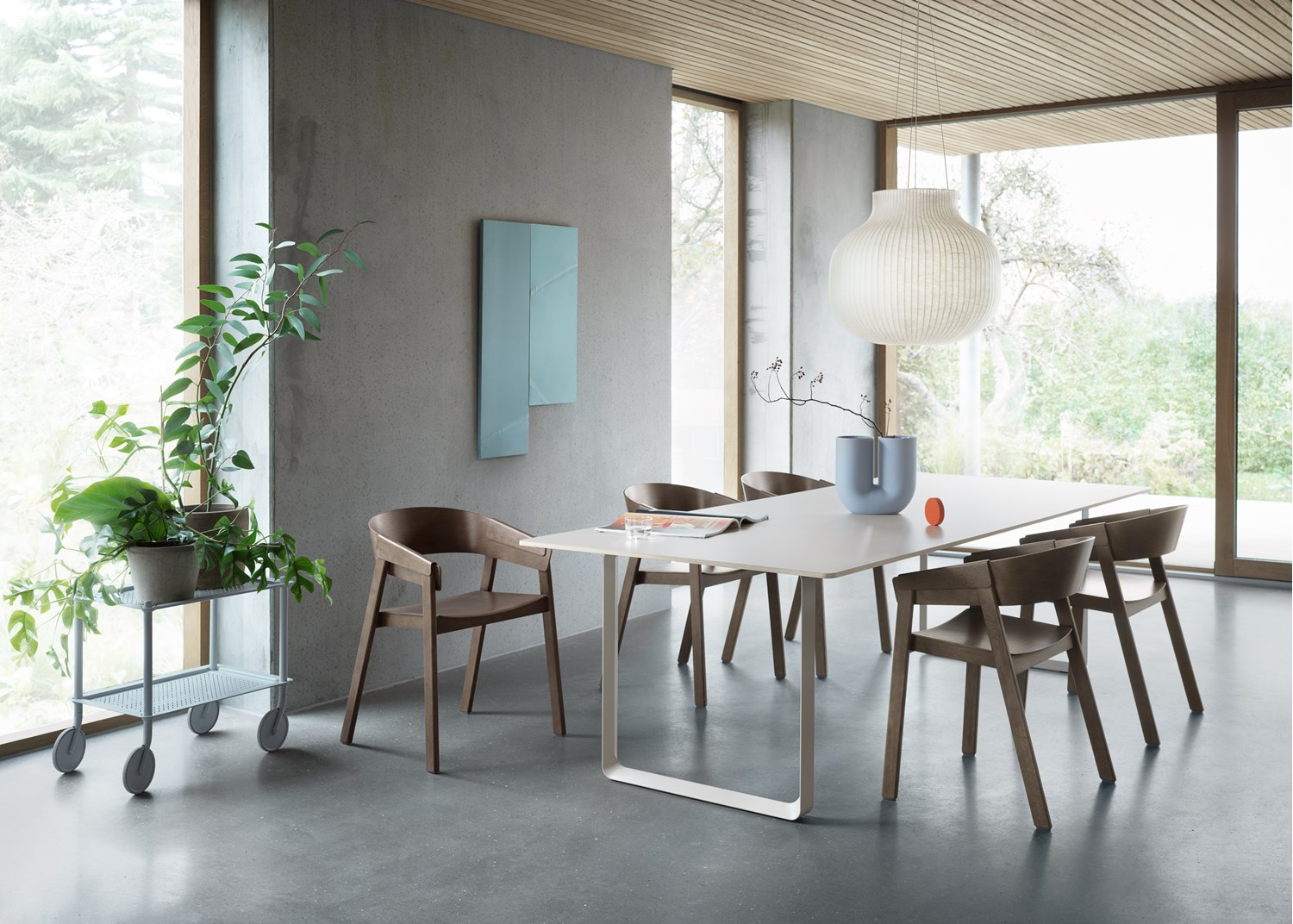 Cover Armchair in Stained Dark Brown, 70/70 Table in Stained Dark Brown/Sand, Strand Pendant Closed Ø60 cm, Flow Trolley 2-Layer in Grey Cover Armchair in Stained Dark Brown, 70/70 Table in Stained Dark Brown/Sand, Strand Pendant Closed Ø60 cm, Flow Trolley 2-Layer in Grey