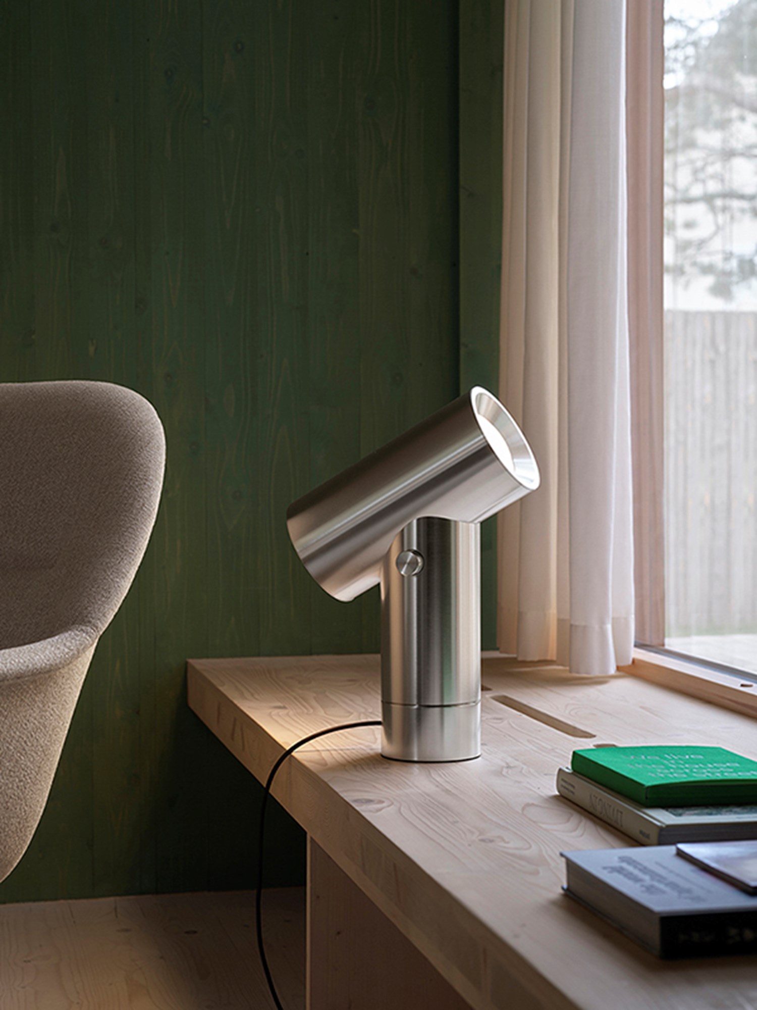 This elegant table lamp showcases a polished aluminum finish, blending industrial charm with minimalist design. Ideal for modern or industrial-themed decor. This elegant table lamp showcases a polished aluminum finish, blending industrial charm with minimalist design. Ideal for modern or industrial-themed decor.