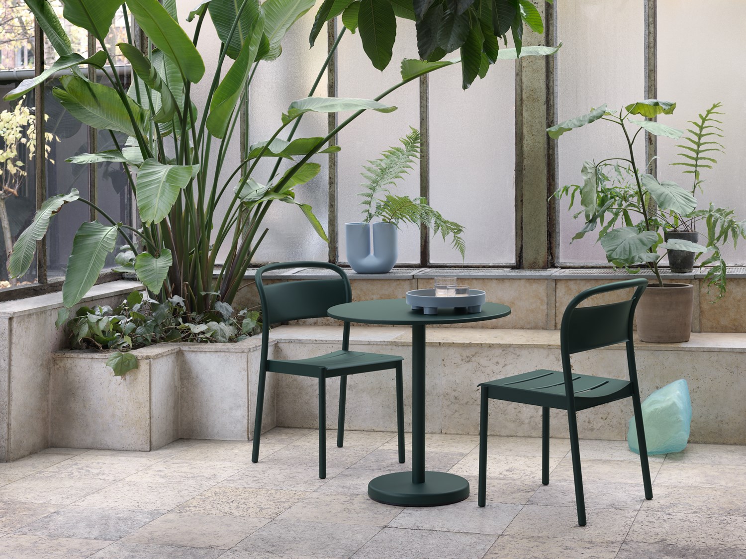 Linear Steel Side Chair in Dark Green, Linear Steel Café Table Ø70 in Dark Green, Platform Tray, Kink Vase Linear Steel Side Chair in Dark Green, Linear Steel Café Table Ø70 in Dark Green, Platform Tray, Kink Vase
