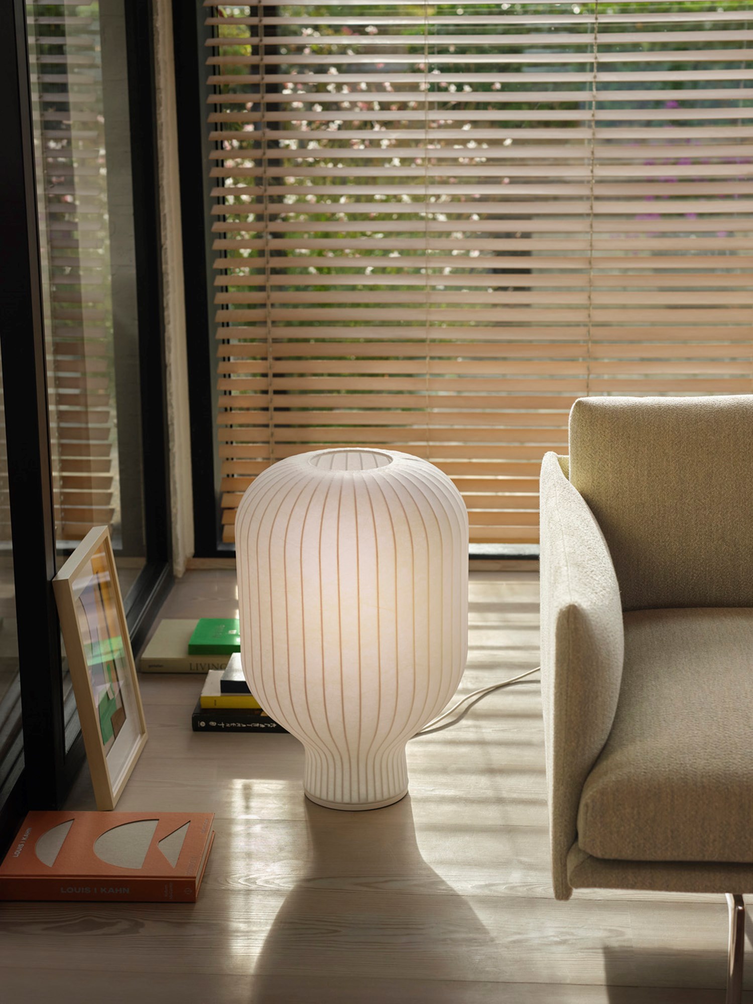 The sculptural form with soft curves understates the feeling of a pleasant light. The Strand Table Lamp H59 size is in between a floor and table lamp, which ensure a very versatile use for several different contexts. The sculptural form with soft curves understates the feeling of a pleasant light. The Strand Table Lamp H59 size is in between a floor and table lamp, which ensure a very versatile use for several different contexts.