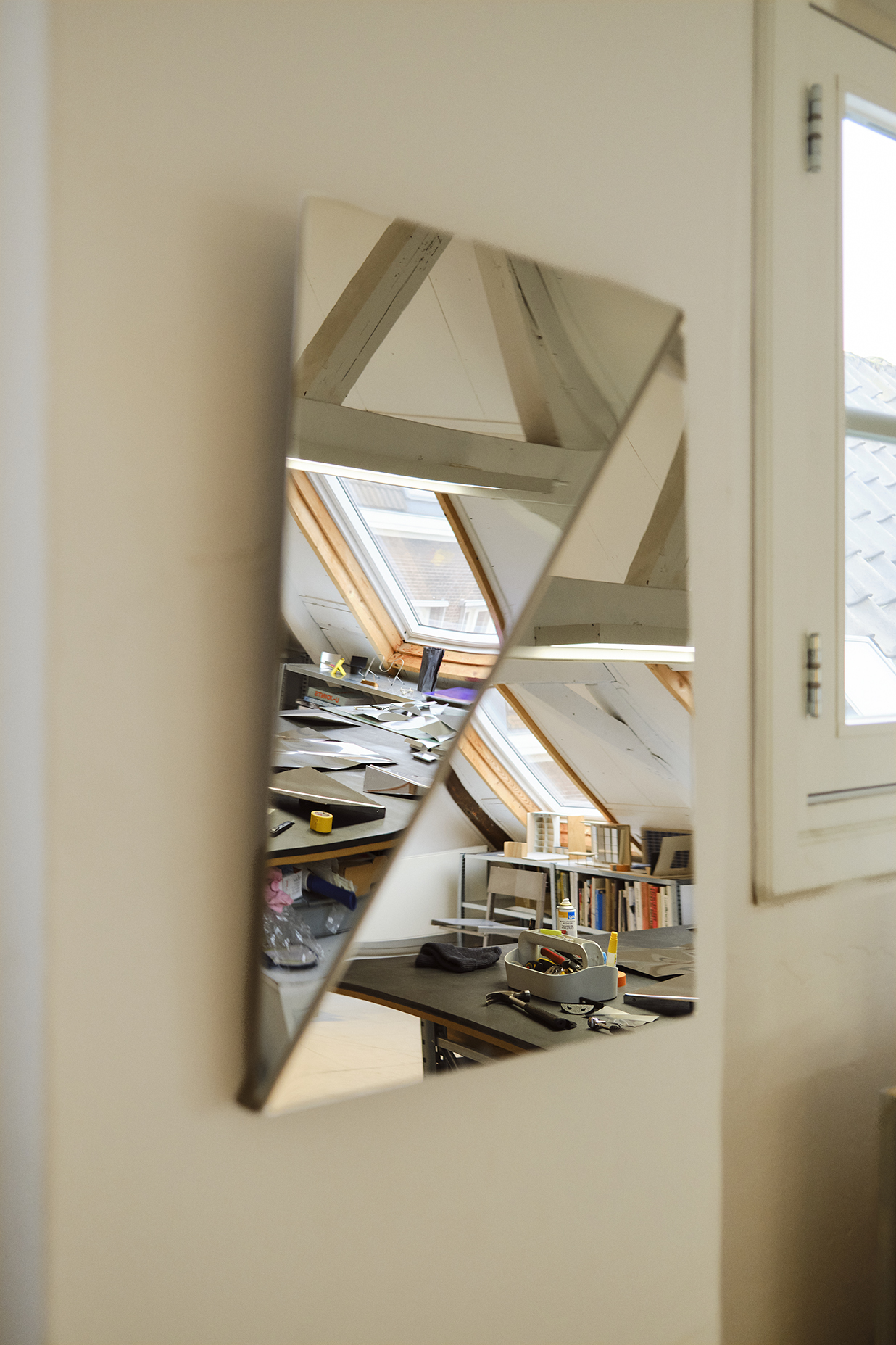 Close up shot of the Gaze Mirror hanging on the wall.