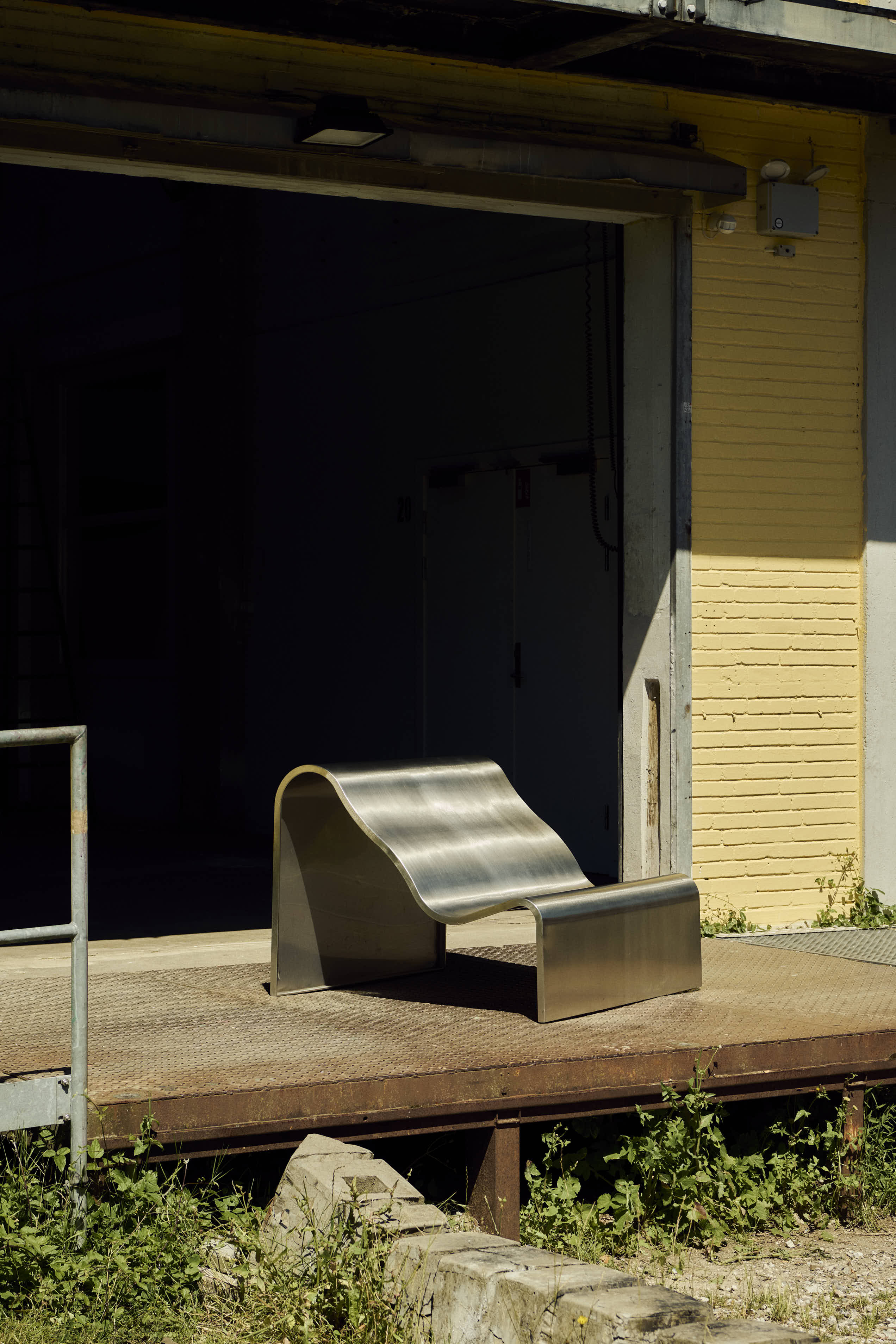 The Dream View Bench by Lise Vester placed in a outdoor setting.