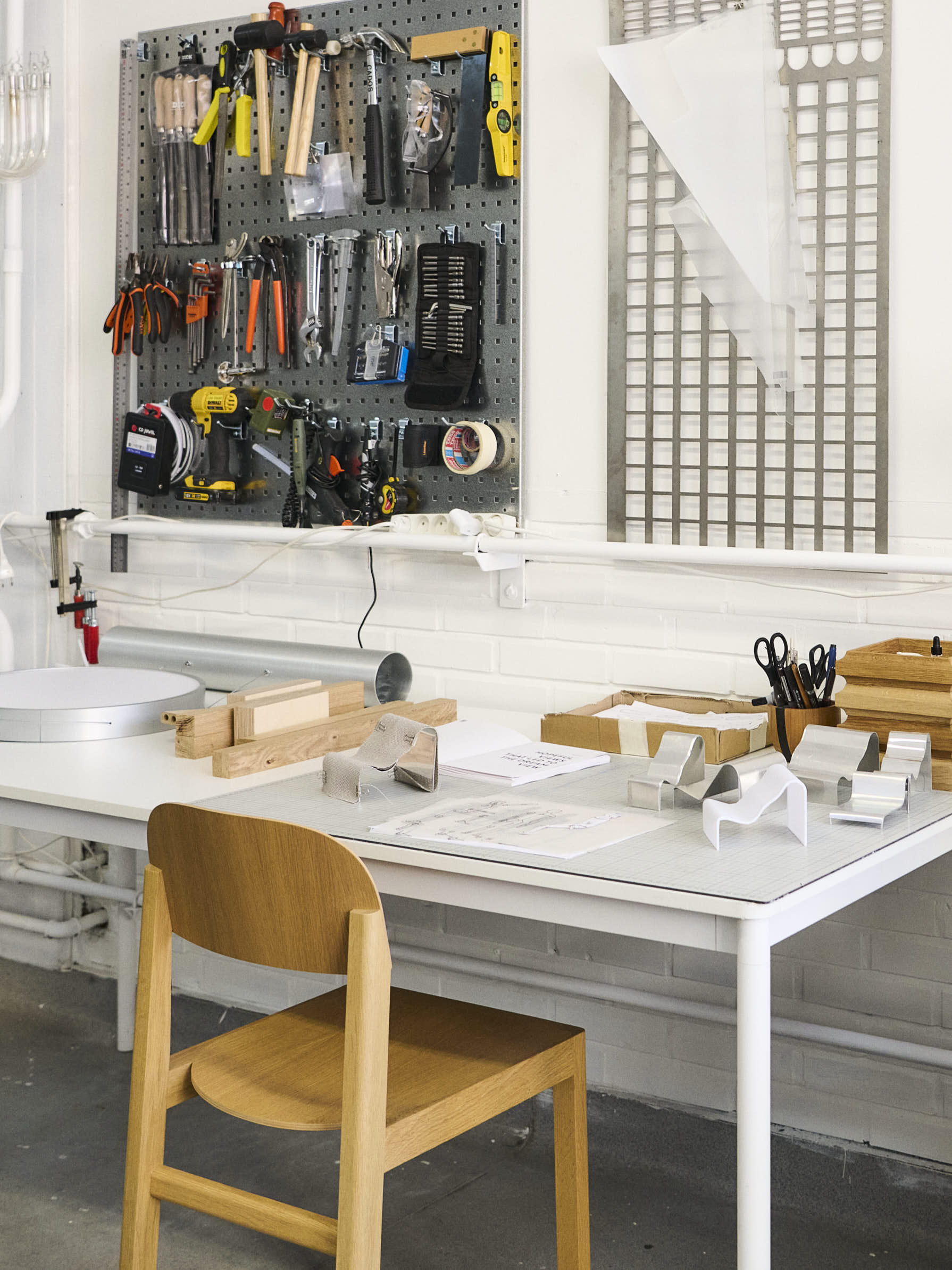 View of Lise Vester’s design studio, showing a carefully arranged creative space with natural materials and soft lighting.