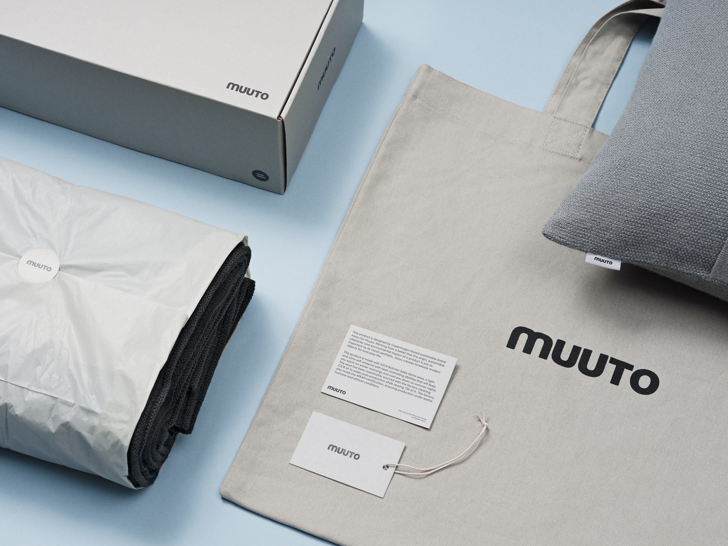 Rhythm-throw-layer-cushion-packaging-Muuto