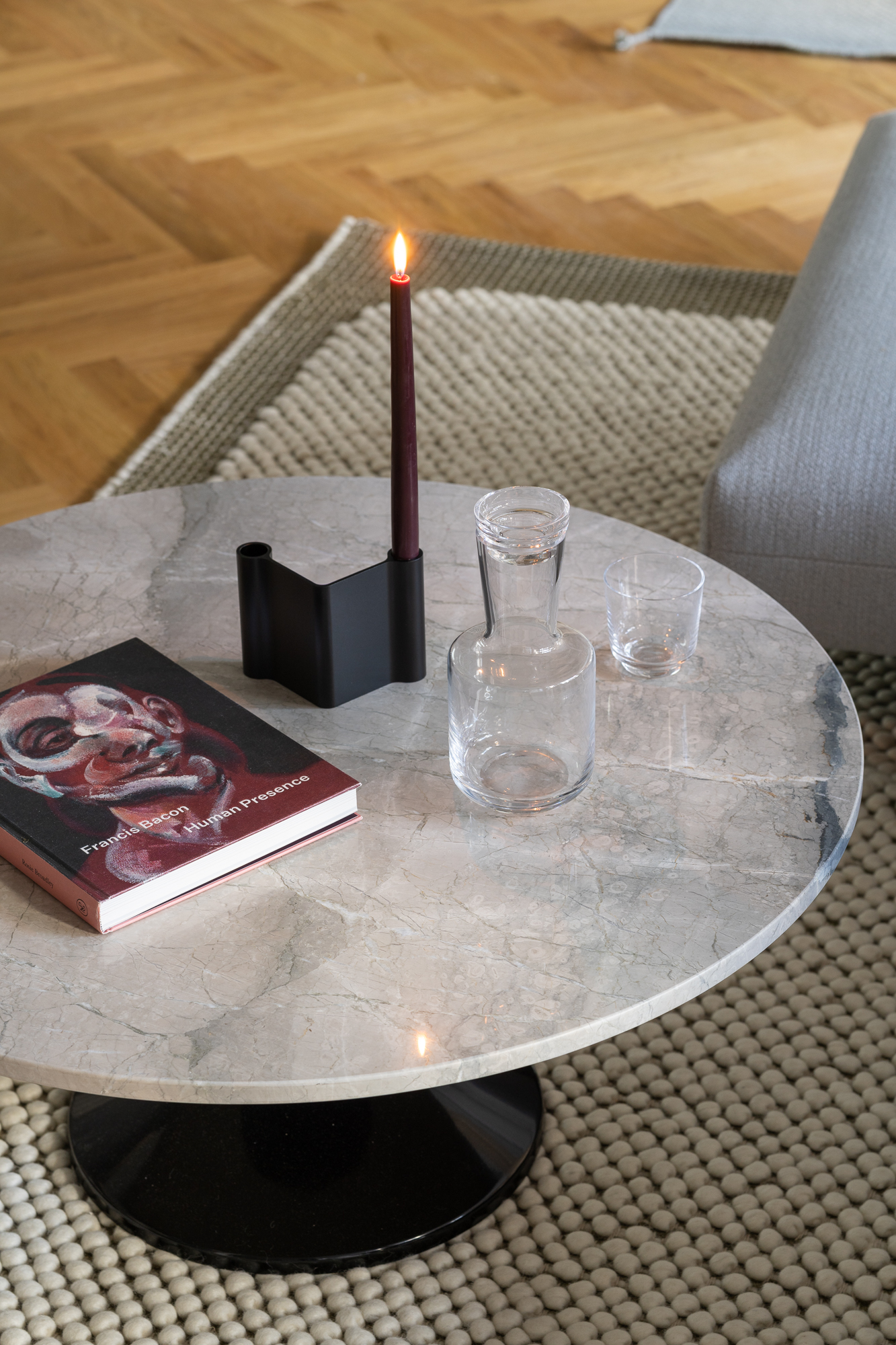 This images shows Midst Coffee Table in marble and Pair Candleholder.