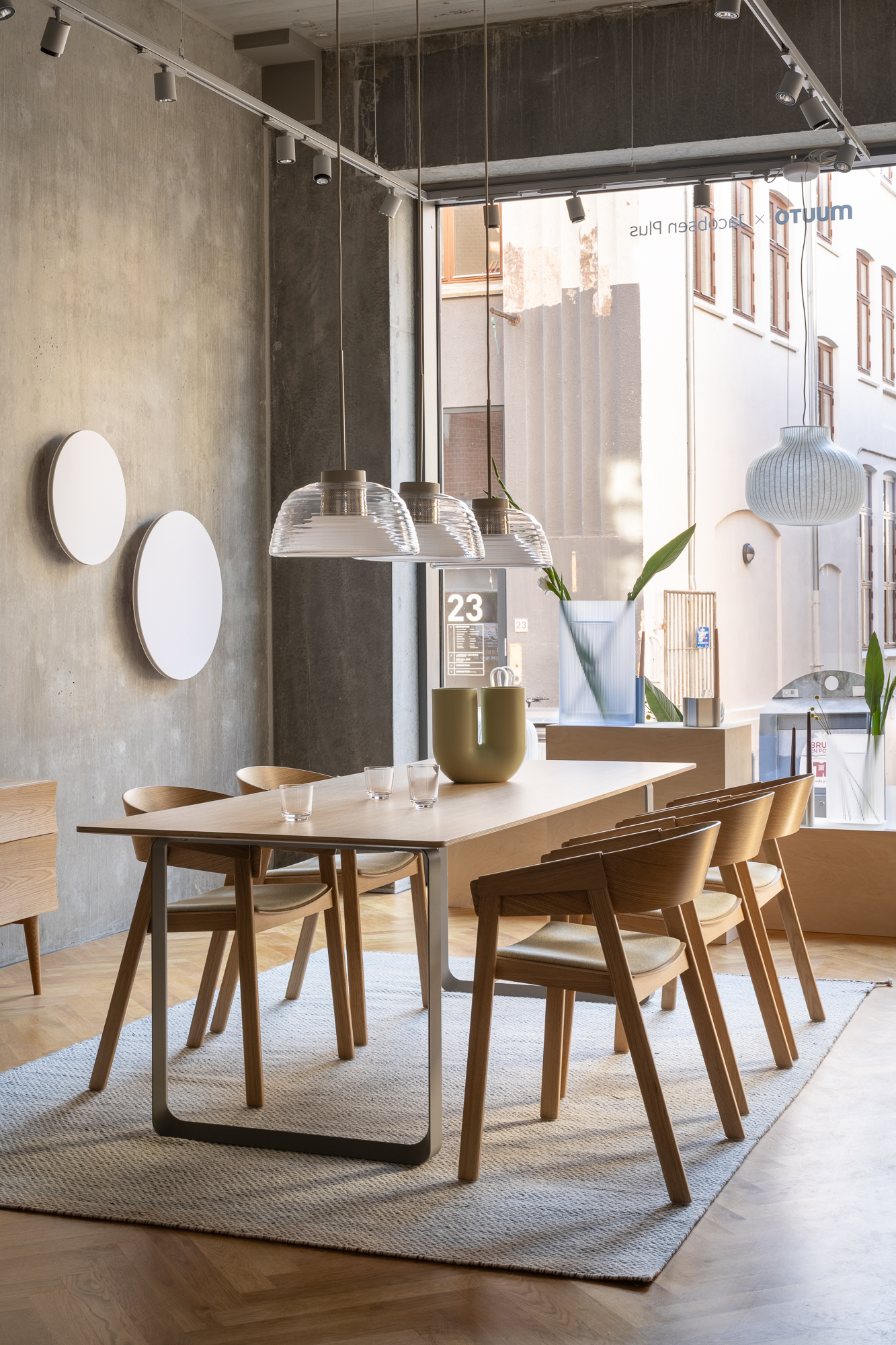 A Muuto dining setting with 70/70 Table and Cover Chairs.